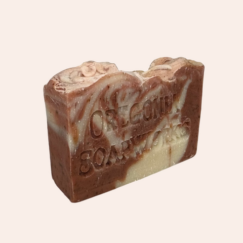 Bar of soap with a marbled design on a gray background