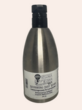 Silver bottle with black cap on a light gray background